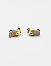 Biya Accessoires gold geometric drop earrings with white enamel inlay.