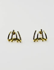 Biya Accessoires gold quad-claw crystal crawler earrings.