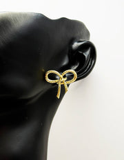 Close-up of premium hypoallergenic imitation jewelry featuring a rope bow design.