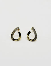 Biya Accessoires gold twisted teardrop hoop earrings with crystals.
