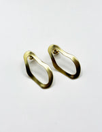 Best fashion jewelry in UAE organic shape gold earrings for women.
