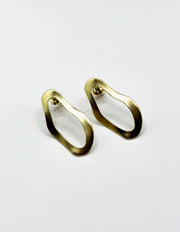 Best fashion jewelry in UAE organic shape gold earrings for women.