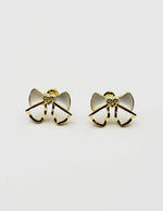 Best fashion jewelry in UAE white pearl inlay bow earrings for women.