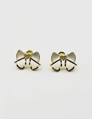 Best fashion jewelry in UAE white pearl inlay bow earrings for women.