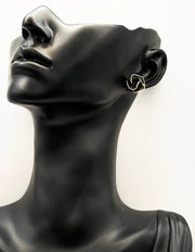 Best fashion jewelry in UAE midnight camellia floral studs for women.