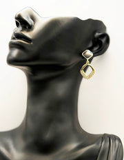 Close-up of premium hypoallergenic imitation jewelry featuring a black stud and crystal frame.