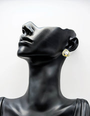 Best fashion jewelry in UAE silver teardrop pearl statement studs for women.