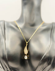 Waterproof gold celestial wing necklace for women in luxury gift box Dubai.