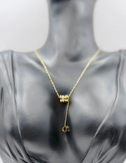 Close-up of premium hypoallergenic imitation jewelry featuring a cylinder slider pendant.