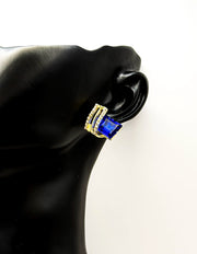 Biya Accessoires emerald blue and gold geometric stud earrings with crystal pavé.