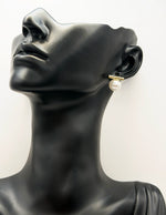 Everyday luxury fashion jewelry gold tone statement studs by Biya Accessoires Dubai.