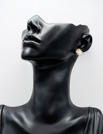Biya Accessoires gold queen bee stud earrings with pearl body.