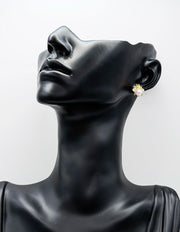 Biya Accessoires gold queen bee stud earrings with pearl body.