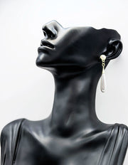 Everyday luxury fashion jewelry gold tone linear drops by Biya Accessoires Dubai.