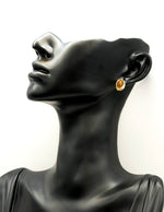 Best fashion jewelry in UAE vintage gold cabochon earrings.