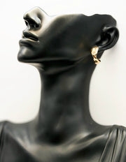 Biya Accessoires gold twisted triple-hoop statement earrings.