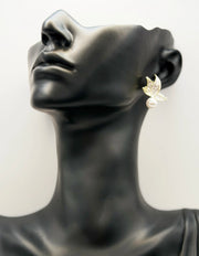 Biya Accessoires gold white enamel butterfly and pearl stud earrings.