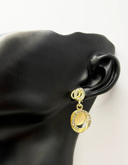 Everyday luxury fashion jewelry gold tone geometric drops by Biya Accessoires Dubai.