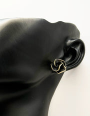 Everyday luxury fashion jewelry gold tone botanical studs by Biya Accessoires Dubai.