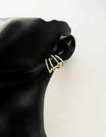 Everyday luxury fashion jewelry gold tone ear climbers by Biya Accessoires Dubai.