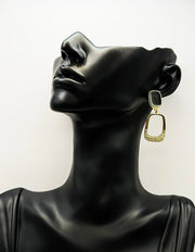 Everyday luxury fashion jewelry gold tone geometric drops by Biya Accessoires Dubai.