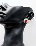 Best fashion jewelry in UAE gold teardrop pearl statement studs for women.