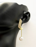 Everyday luxury fashion jewelry gold tone pearl threaders by Biya Accessoires Dubai.