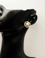 Best fashion jewelry in UAE ivory white and gold swirl pearl earrings for women.