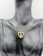 Everyday luxury fashion jewelry heart medallion with durable PVD gold coating.