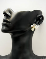 Everyday luxury jewelry uae botanical earrings by the best jewelry shop in UAE.