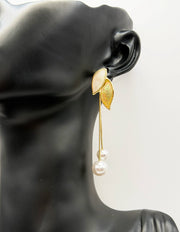 Best imitation jewellery brands in uae gold leaf earrings with long pearl chains.
