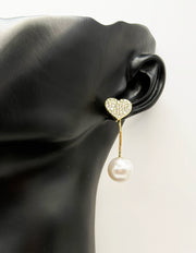Best imitation jewellery brands in uae gold earrings with rhinestone hearts and pearls.