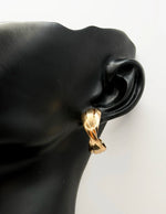 High polish chunky twisted stud earrings for women.