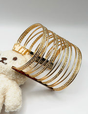 Waterproof 18K gold 14 piece textured bangle stack Biya Accessoires UAE gift for her