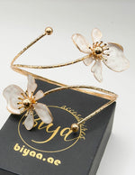Non-tarnish botanical floral armlet for women Dubai luxury fashion.