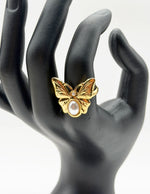 Waterproof gold romantic butterfly ring with pearl body Dubai.