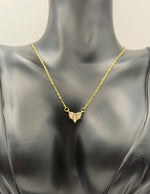 Modern luxury gold and crystal geometric heart statement necklace gift.