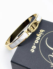 Waterproof gold white enamel hinge bracelet for women Dubai.