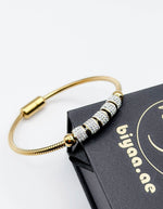 Waterproof gold magnetic clasp charm bracelet for women Dubai.
