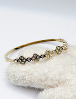 Modern luxury fine art editorial jewelry crystal clover bracelet gift for her.