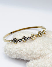 Modern luxury fine art editorial jewelry crystal clover bracelet gift for her.