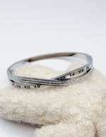 Hypoallergenic non-tarnish high polish silver twisted bangle UAE