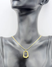 Premium quiet luxury gold organic shape necklace gift Dubai.