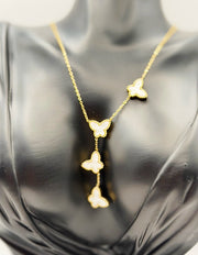 18K gold plated white butterfly lariat necklace by Biya Accessoires.