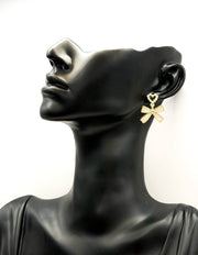 Everyday luxury jewelry uae coquette earrings by the best jewelry shop in UAE.