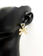 Everyday luxury jewelry uae coquette earrings by the best jewelry shop in UAE.