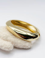 gold Non-tarnish sculptural wrap statement bangle for women Dubai luxury fashion.