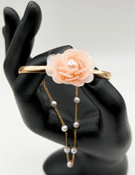 Non-tarnish blush floral cuff and delicate chain set Dubai luxury fashion.