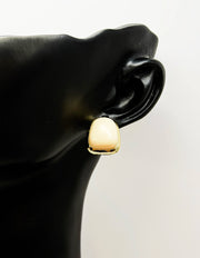 Close-up of premium hypoallergenic imitation jewelry featuring an ivory and gold design.
