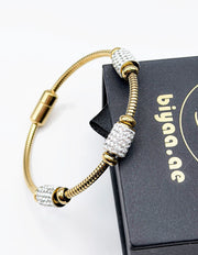18K gold plated crystal pave station snake chain bracelet by Biya Accessoires.